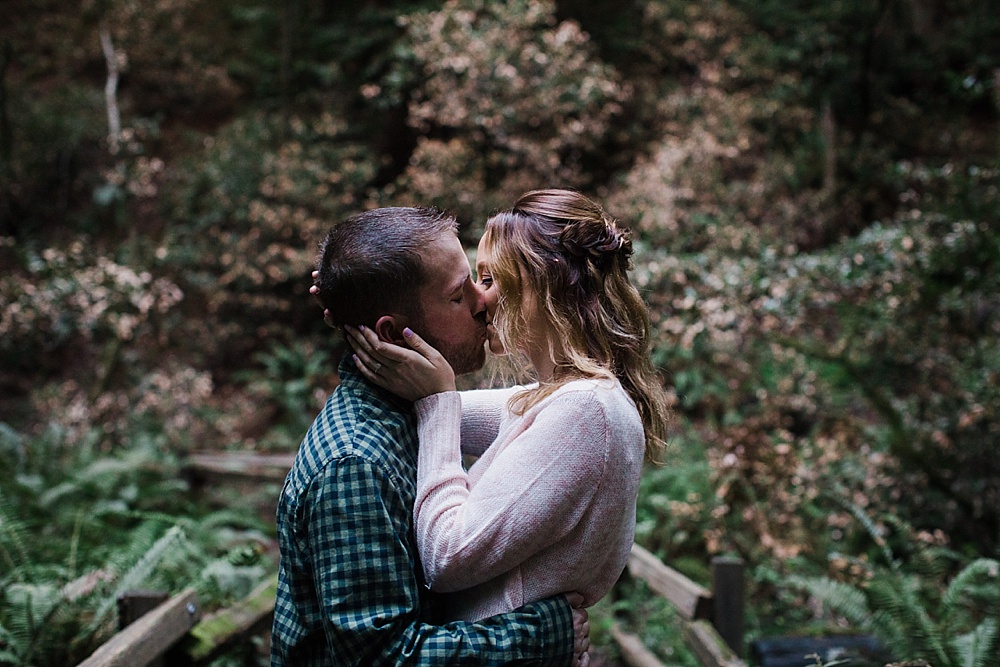 Couple kissing in woods Marin County Engagement Session