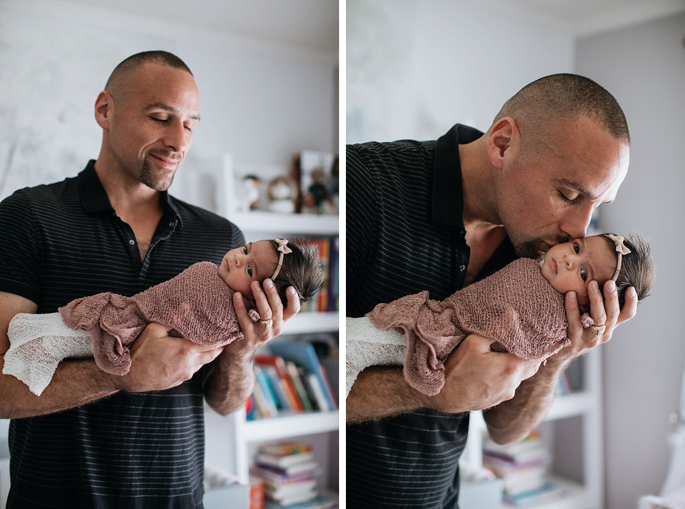 San Francisco newborn photography with Dad kissing baby