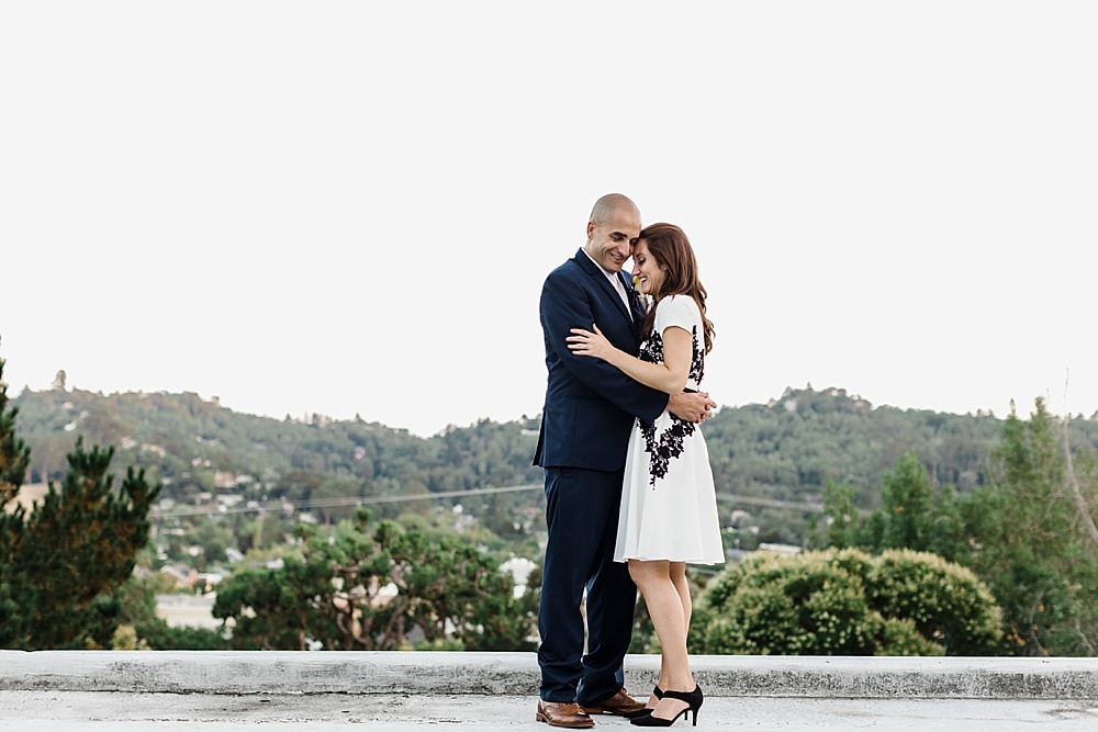 Bride and groom embrace at Elks Lodge San Rafael Wedding by Amy Thompson Photography