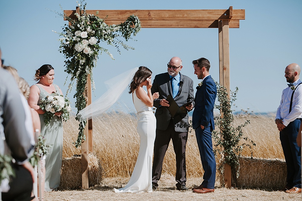 Bride cries at a Bloomfield farms wedding by amy thompson photography