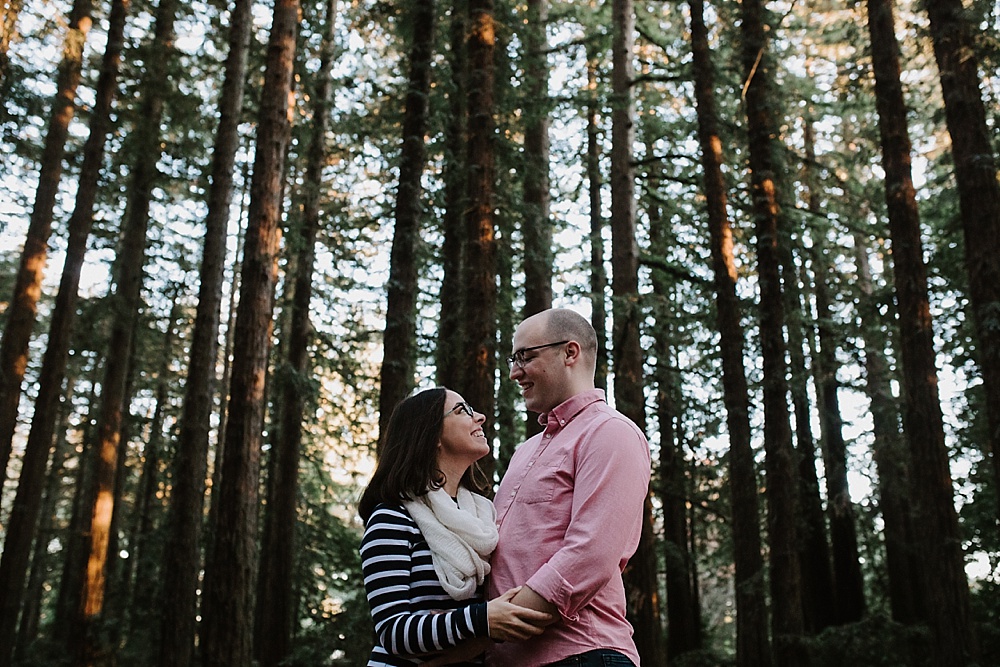 Couple gazing at eachother at redwood regional park engagement by amy thompson photography