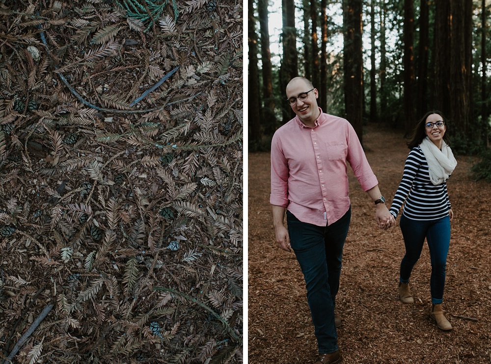 couple walking through redwood regional park engagement