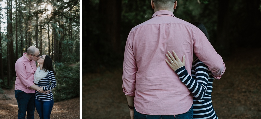 couple embracing at redwood regional park engagement