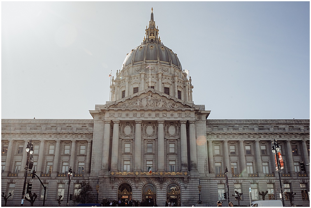 Outside of San Francisco City Hall Wedding Ceremony by amy thompson photography