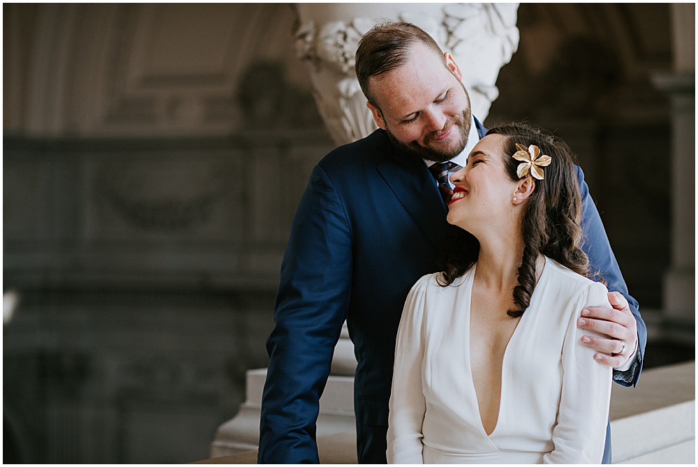 Happy couple after San Francisco City Hall Wedding Ceremony by amy thompson photography