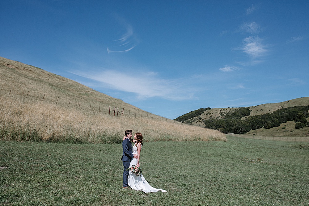 Bride and groom portraits with hills at Rosewood Events by amy thompson photography