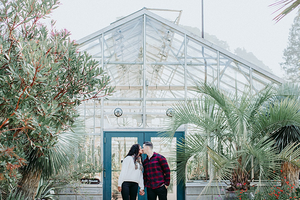 San Francisco Engagement Shoot in front of a green house by amy thompson photography
