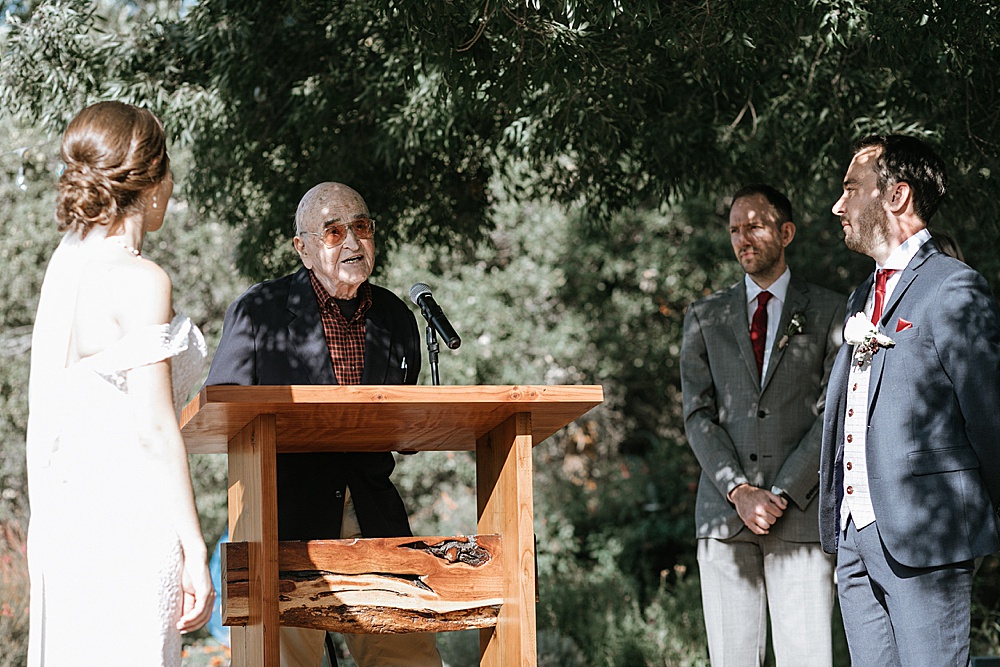 Grandfather officiating the wedding ceremony