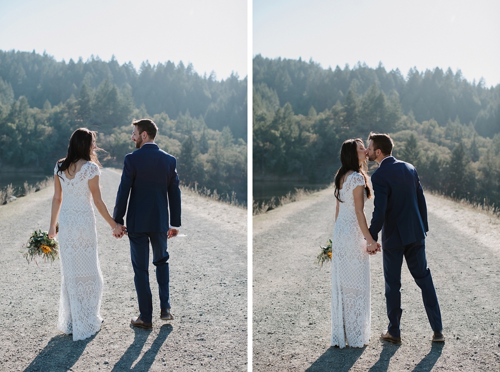 Bride and groom walk down trail at Marin County wedding